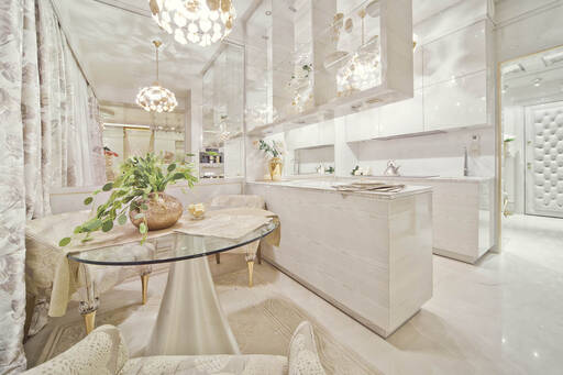 Lidia Bersani / Luxury Interior - Modern Kitchen finished in glossy white wood. Top - white matble with Swarovski decorations.