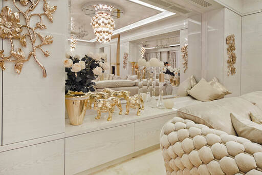 Lidia Bersani / Luxury Interior - White, wooden, modern cabinet finished in high gloss with golden decorations.