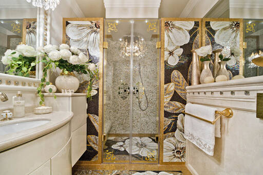 Lidia Bersani / Luxury Interior - Luxury Bathroom, white, golden mosiac and marble crema marfil, cream vase with golden roses, shower with golden painted glass door 
